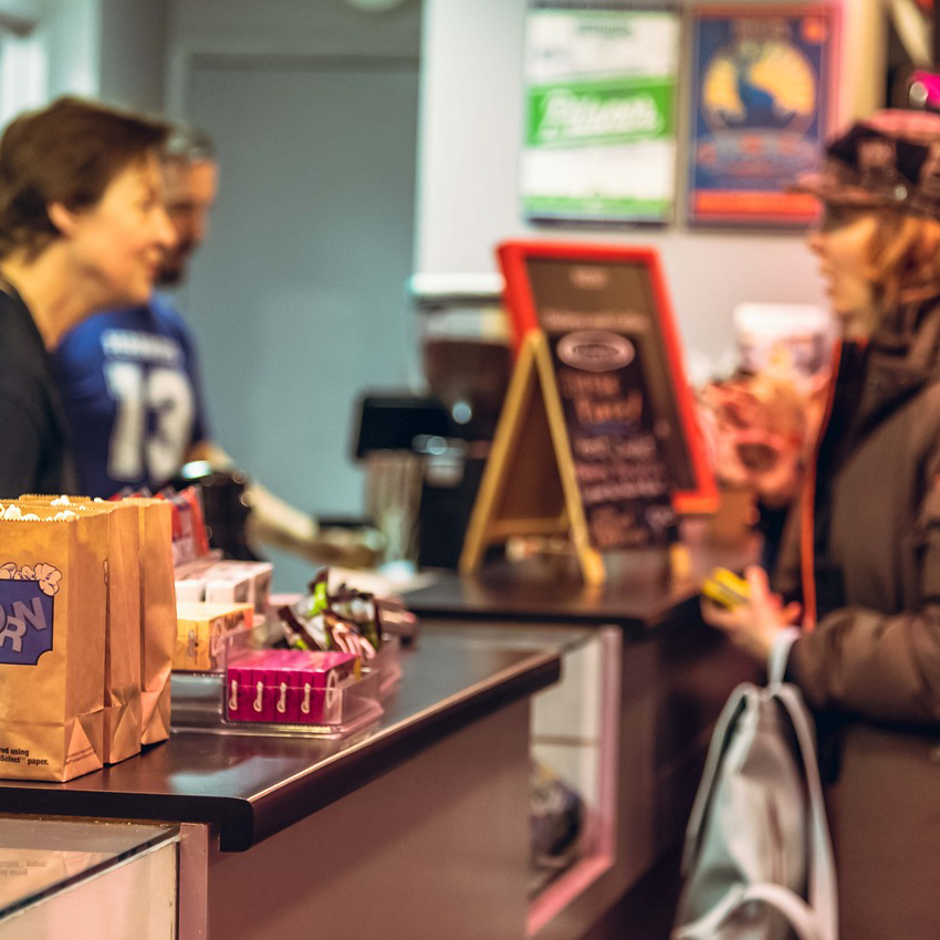 Modern movie theater concession counter showcasing extraordinary customer experience in entertainment